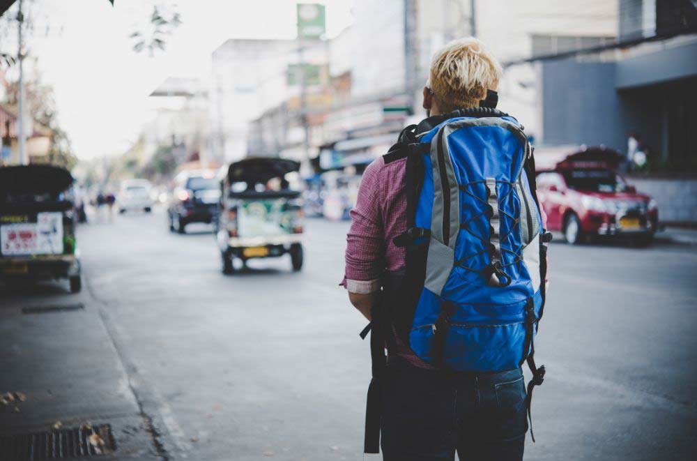 Photo of man with back bag